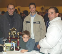 de gauche à droite : Alain Gomez, Dunkan, Jonathan et Jacques BOSSION lors de la remise des trophées des sports